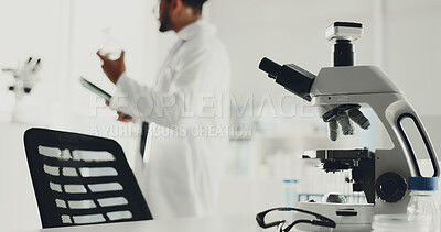 Buy stock photo Microscope, man and scientist with tablet in lab for research, medical study and testing sample. Machine, person or biotechnology for experiment, dna production and confidence of vaccine breakthrough
