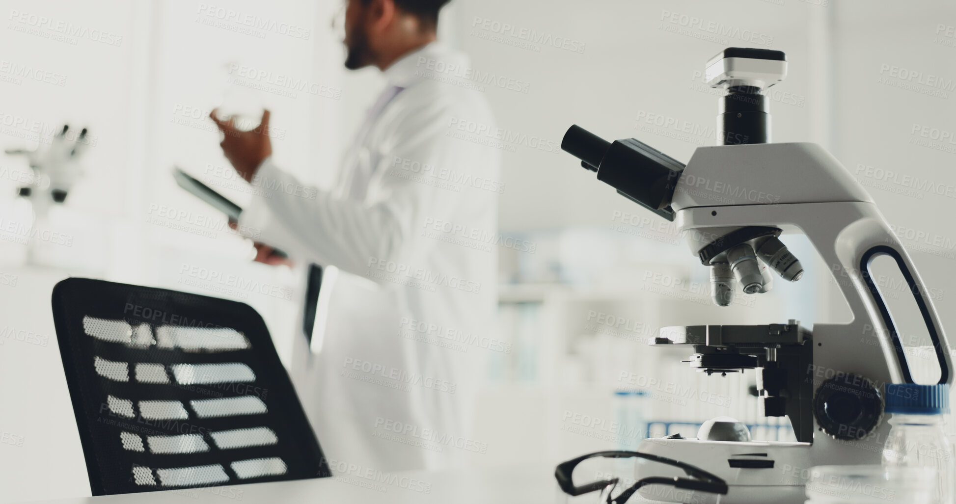 Buy stock photo Microscope, man and scientist with tablet in lab for research, medical study and testing sample. Machine, person or biotechnology for experiment, dna production and confidence of vaccine breakthrough