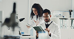 People, scientist and tablet with research at laboratory for medical statistics, analysis or report. Man, woman or team with technology for forensic science, exam or study together at clinic trial