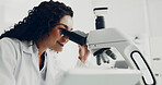 Scientist, woman and study with microscope in lab for medical innovation, DNA solution and testing. Science, person and happy with microbiology equipment for cancer research and vaccine development