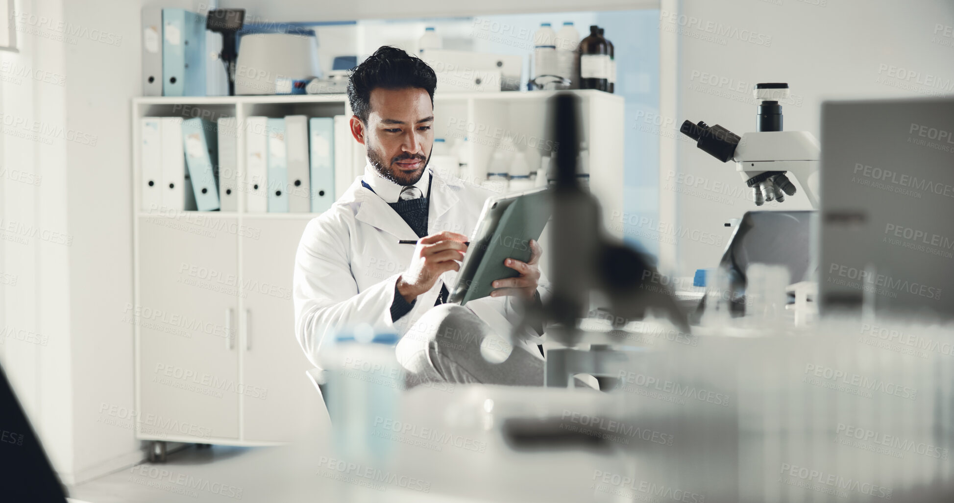 Buy stock photo Man, tablet and scientist in lab for research report, medical review or stylus for online analysis. Science, male doctor and computer for reading evaluation, forensic study and innovation technology