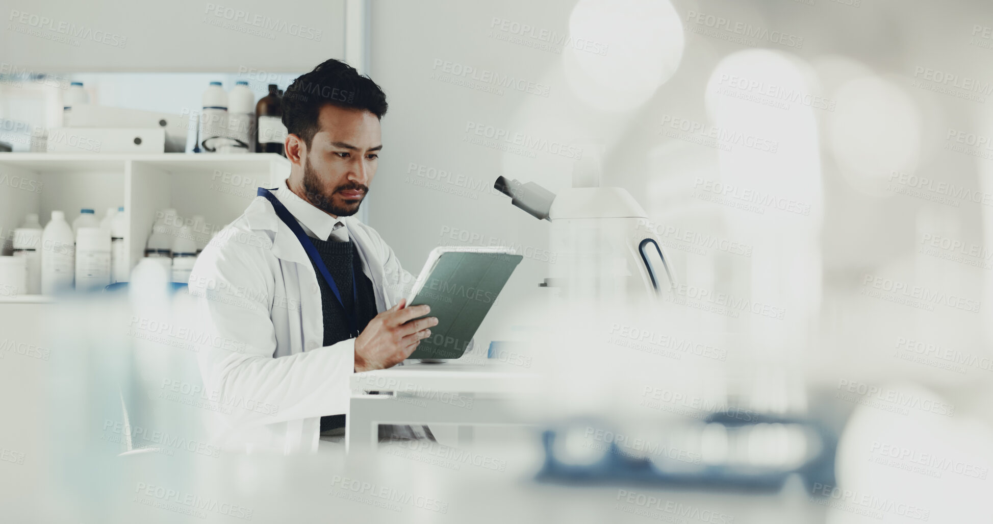 Buy stock photo Science, research and man in lab, tablet and innovation with chemistry experiment, app and internet. Medical, scientist and person in workplace, digital tech and studying results with healthcare