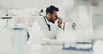 Scientist, man and research with microscope in lab for medical innovation, DNA solution and testing. Science, person and laptop with microbiology equipment for sample analysis and vaccine development