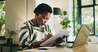 Buy stock photo Finance, writing and black woman with bookkeeping in home for audit, savings and tax returns. Remote work, accountant or laptop with clipboard for account review, financial report or asset management