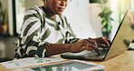 Hands, black woman and typing on laptop at house for accounting, finance report and review budget. Female person, audit and online with financial results, statistics document and expenses information