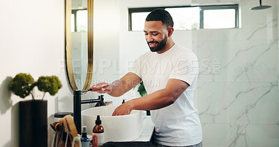 Buy stock photo Home, man and washing hands with water for hygiene, germ protection or clean skin. Tap, rinse and happy person in bathroom for self care, safety and bacteria removal for health with morning routine