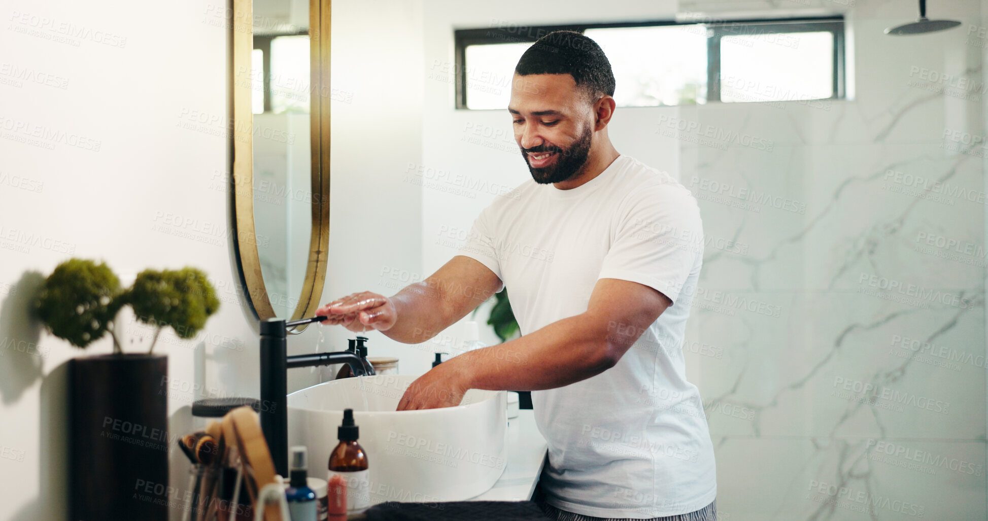Buy stock photo Home, man and washing hands with water for hygiene, germ protection or clean skin. Tap, rinse and happy person in bathroom for self care, safety and bacteria removal for health with morning routine