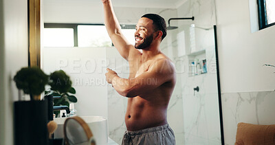 Buy stock photo Hygiene, man and spray deodorant in home for sweat control, fresh fragrance or getting ready. Mirror, bathroom and happy person with underarm antiperspirant for morning routine, grooming or self care