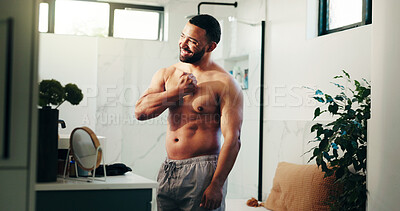 Buy stock photo Bathroom, man and flex muscles in mirror for fitness progress, biceps growth and workout pride. Person, happy bodybuilder and strong arms in home with grooming routine, getting ready and body goals