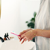 Bathroom, hands and woman with toothbrush for dental health, oral ...