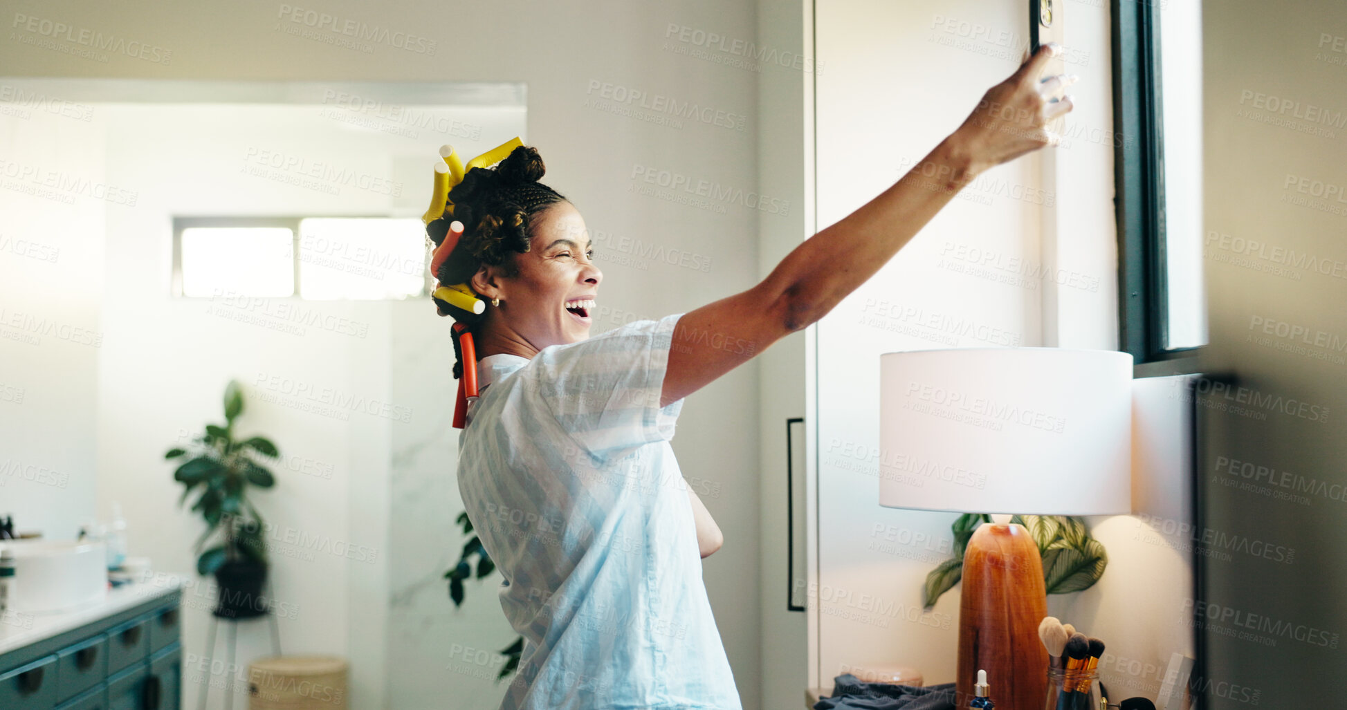 Buy stock photo Beauty, woman or selfie with curlers in bathroom for getting ready vlog, morning routine or haircare. Influencer, girl and photography in home for hairstyle makeover, social media post and self care