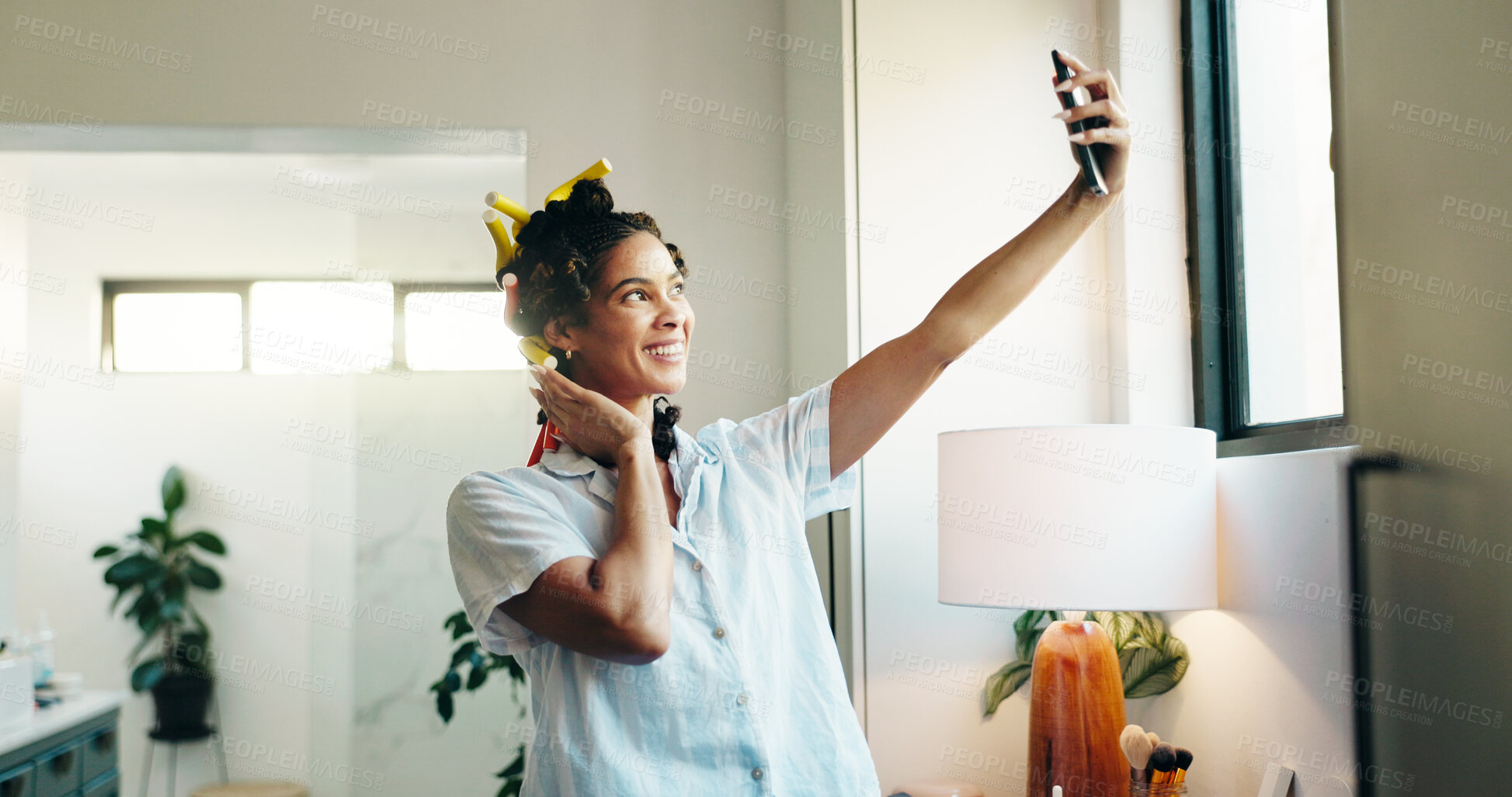 Buy stock photo Curlers, selfie and woman with smile, home and confidence with grooming routine. Heatless style, influencer and person with internet, getting ready or start day with hair care and content creation