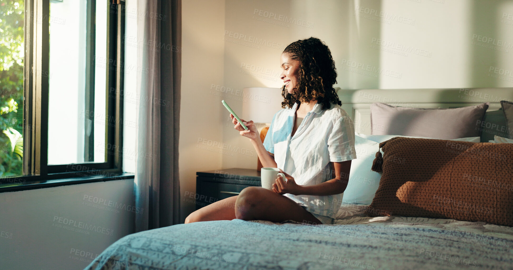 Buy stock photo Mobile, coffee and happy woman in bedroom for morning news, chat forum and reading notification. Phone, tea and person on bed for social media, blog or text message for online communication in home