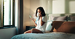 Phone, drinking coffee and woman in bedroom for relax, peace or calm for morning news in home. Mobile, tea cup and person on bed for social media, blog or text on internet with espresso beverage