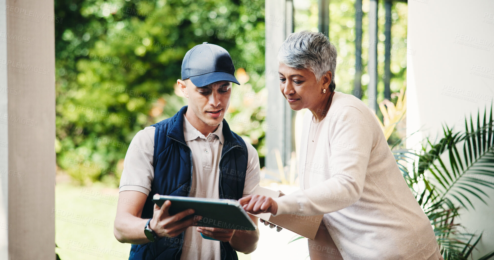 Buy stock photo Delivery, old woman and package with tablet at front door for digital signature, POS or service. Courier, logistics and customer with box for online shopping, parcel distribution or ecommerce at home