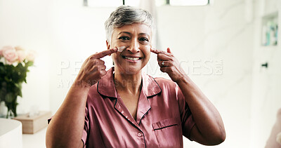 Buy stock photo Senior, portrait and happy woman with lotion for skincare, face cream or facial treatment at home. Female person, touch and smile with moisturizer for morning routine or health in bathroom at house