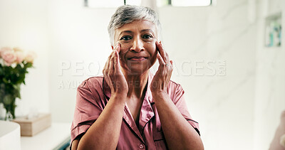 Buy stock photo Senior, portrait and woman with lotion for skincare, face cream or facial treatment at home. Female person, touch and smile with moisturizer for morning routine or dermatology in bathroom at house