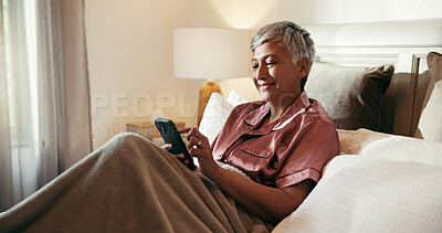 Buy stock photo Phone, smile and mature woman in bed with dating app, social media or comedy video on internet. Happy, technology and senior female person with scroll on mobile with cellphone in home for break