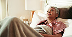 Thinking, tired and calm with old woman in bed for insomnia, reflection and retirement. Fatigue, sleeping pills and memory with senior person in bedroom of home for mental health, crisis and idea