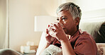 Bed, drinking water and mature woman in home for wellness, hydration and morning routine. Nutrition, thinking and thirsty pensioner in bedroom with liquid, aqua and health benefit in retirement