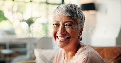 Buy stock photo Happy, home and portrait of senior woman laugh on sofa for relaxing, rest and chill in living room. Retirement, morning and face of mature person on couch for comfort, positivity or wellness in house