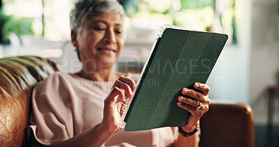 Buy stock photo Senior, woman or hands with tablet on sofa for online gaming, gambling app or internet browsing. Retirement, old person and relax with digital tech in home for streaming subscription and bingo site