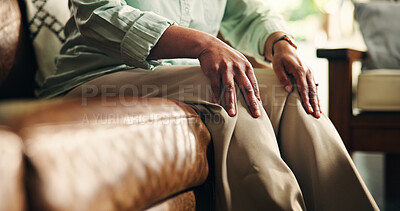 Buy stock photo Knee pain, hands and arthritis with old woman on sofa for osteoporosis, injury and emergency. Parkinson cramp, mobility risk and anatomy with senior person in living room of home for fibromyalgia