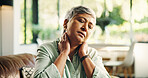 Living room, neck pain and senior woman with tension, massage or discomfort of injury from bad posture. Sore, swollen and stiffness of joints, osteoarthritis or muscle strain for old person in house