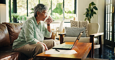 Buy stock photo Old woman, documents and drinking water in home with finance, laptop and review for financial results. Person, paperwork and thinking with computer, bills and glass with retirement planning at house