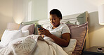 Reading, phone and chat with black woman in bedroom for smile, notification and morning routine. Relax, social media and wellness with person in home for contact, typing and online news update