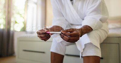 Buy stock photo Reading, results and hands with pregnancy test, bedroom or expectant mother with confirmation stick. Fertility, check and black person with home exam kit, hCG hormone and tool for outcome of IVF