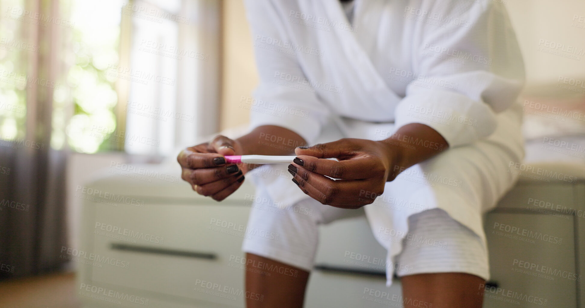 Buy stock photo Reading, results and hands with pregnancy test, bedroom or expectant mother with confirmation stick. Fertility, check and black person with home exam kit, hCG hormone and tool for outcome of IVF