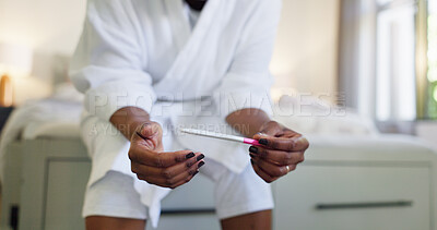 Buy stock photo Check, results and hands with pregnancy test, waiting and woman with pee stick to confirm in bedroom. Review, info and person with home exam kit, read and tool for outcome on bed and apartment