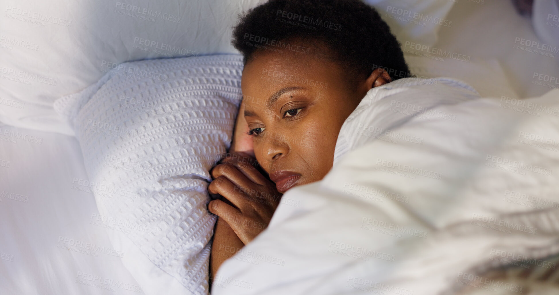 Buy stock photo Thinking, woman and sleepless on bed, stress or anxiety for unemployment, fired or bedroom at night. Contemplating, jobless or black person with insomnia in home, late and worry for rent in apartment