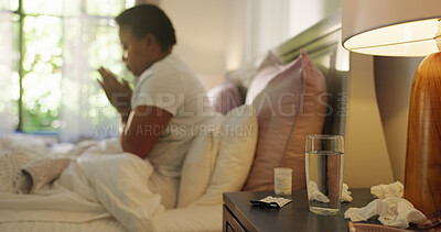 Buy stock photo Pills, water or sick black woman in bed with allergy, drugs or flu in home with illness and infection. Tablets, virus or person with tissue paper for mucus, sneeze or fever symptoms with medicine