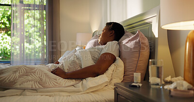 Buy stock photo African woman, sick and tired in bed, thinking and recovery from flu, virus or disease in morning. Person, fatigue and illness with blanket, rest and rehabilitation for wellness in bedroom at house