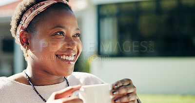 Buy stock photo Happy, thinking and black woman with coffee outdoor in morning with memory, reflection or nostalgia. Smile, ideas and African female person with cappuccino for peace, calm or relax in home backyard.