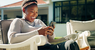 Buy stock photo Happy, laugh or black woman with phone in guest house on holiday, social media or online review. Funny meme, outdoor or female person with mobile for text, feedback or reading accommodation website