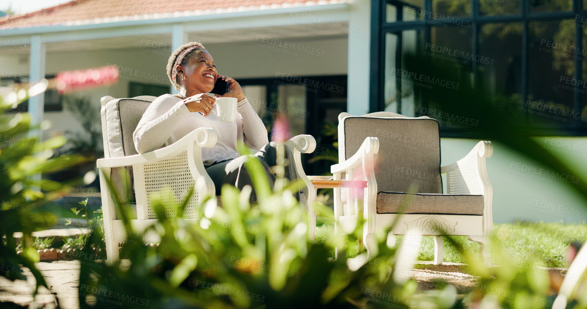 Buy stock photo Phone call, happy and black woman in backyard to relax for talking, contact and connection. Weekend, garden and person outdoor on smartphone for communication, networking and conversation in house