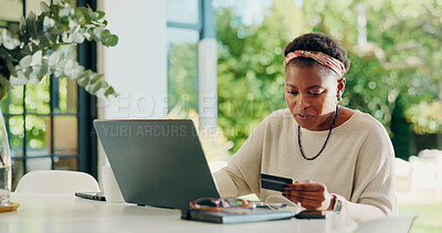 Buy stock photo Black woman, laptop and credit card for payment in home with booking, typing and remote work on web. Person, virtual assistant and purchase for online shopping, ecommerce or easy transaction in house