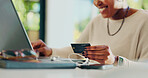 Black woman, hands and credit card with laptop for online shopping, payment or banking at home. Female person, shopper or smile with computer for ecommerce, virtual purchase or remote transaction
