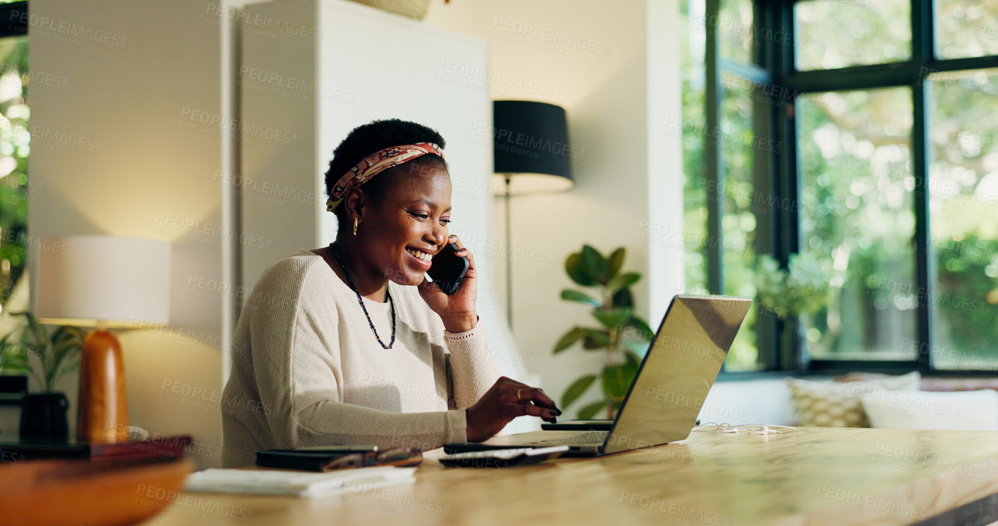 Buy stock photo Phone call, happy and black woman on laptop for remote work, virtual assistance and consulting. Planning, house and person on computer talking on smartphone for communication, contact and website