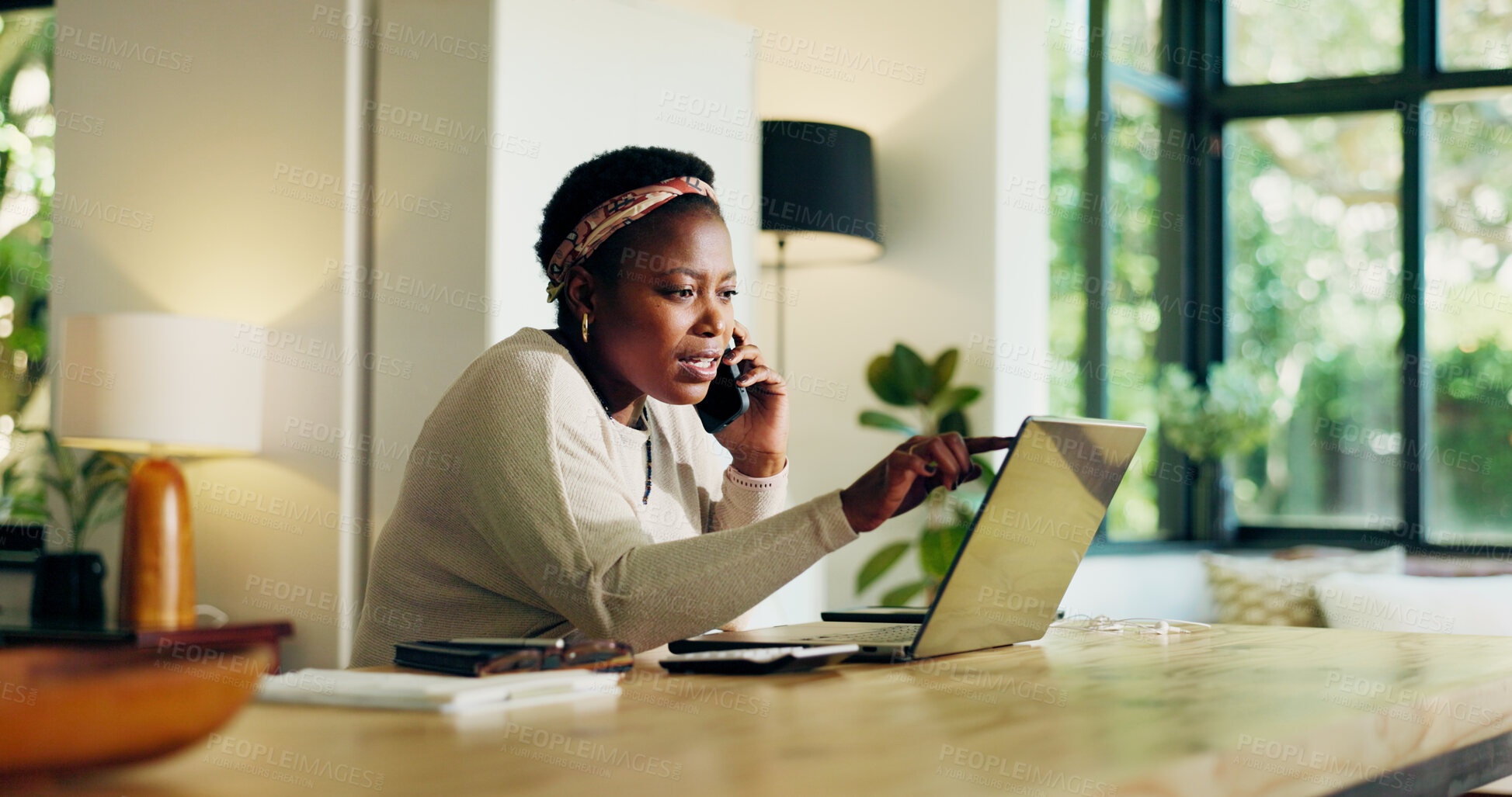 Buy stock photo Phone call, laptop and black woman for remote work, planning and virtual assistance. Consultant, house and person on computer talking on smartphone for communication, contact and online project