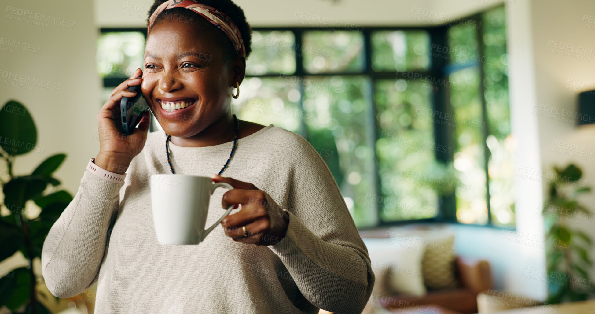 Buy stock photo Black woman, phone call and happy in home with coffee, conversation and listen with mobile network. African person, smile and smartphone with chat, drink or tea with discussion in morning at house
