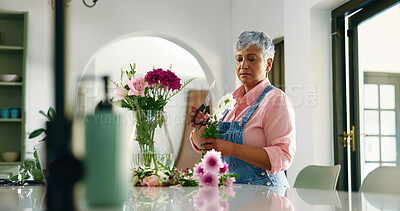 Buy stock photo Old woman, florist and cutting flowers at house of special occasion, aesthetic and natural bloom. Senior person, arrangement and plant care of floral bouquet, hospitality decoration and resort setup
