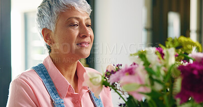 Buy stock photo Senior woman, flowers and gift at house for special occasion, aesthetic and natural bloom. Elderly person, arrangement and plant care with floral bouquet, hospitality decoration and setup of resort