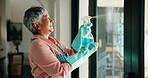 Cleaning, window and senior woman with spray bottle for hygiene, housekeeping and maid service. Washing, glass and person with shine, detergents and liquid for bacteria, disinfection and dust in home