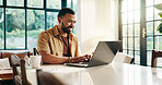 Laptop, typing and happy man in home office for hybrid work, finance and positive cashflow. Computer, freelancer and reading email online for accounting, bookkeeping and revenue growth for investment