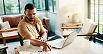 Data, freelancer and man with paperwork for problem solving, financial analysis or reading. Chart, hybrid work and serious person in home office for thinking, review metrics and stats for investment