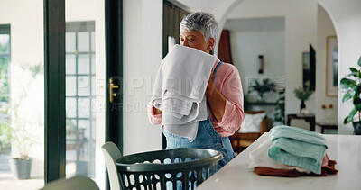 Buy stock photo Sniff, blanket and woman with laundry, home and smell of clean washing, fragrance and mature person. Breathing, scent and housekeeper with soft linen, hygiene and chores for housework in apartment
